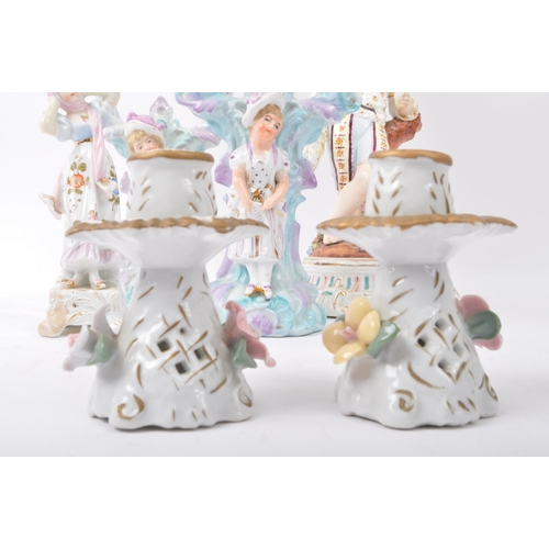 44 - A collection of vintage 20th Century Sitzendorf style porcelain china figurines and candle candelabr... 