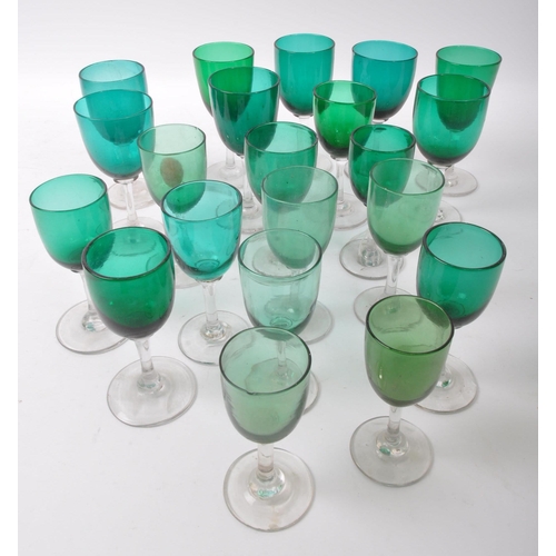 52 - A collection of 19th Century George III Bristol Green wine drinking glasses. Each of similar form wi... 