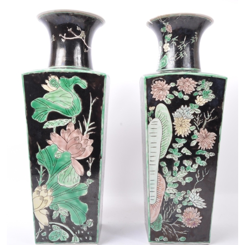 54 - A pair of 20th century Chinese Oriental ceramic vases in the manner of Famille Noire porcelain. The ... 