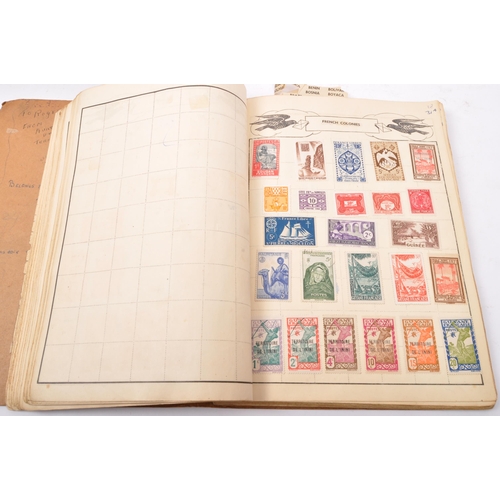 545 - A collection of early 20th century and later British and foreign postage stamps held across five pre... 