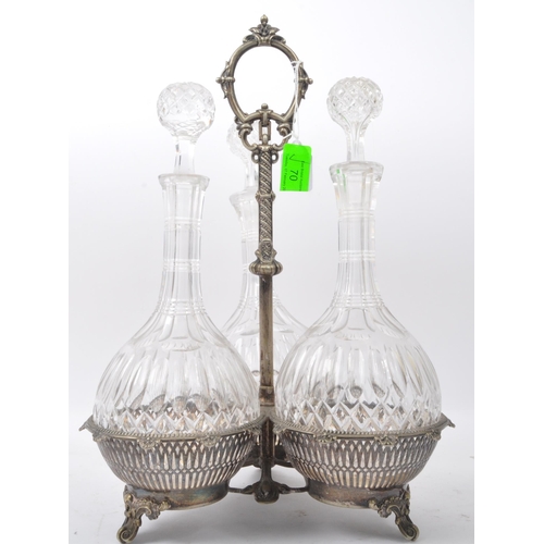 70 - A Victorian 19th century silver plated three galleried basket tantalus with three decanters of bulbo... 