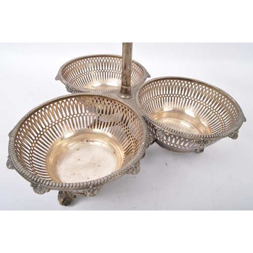 70 - A Victorian 19th century silver plated three galleried basket tantalus with three decanters of bulbo... 