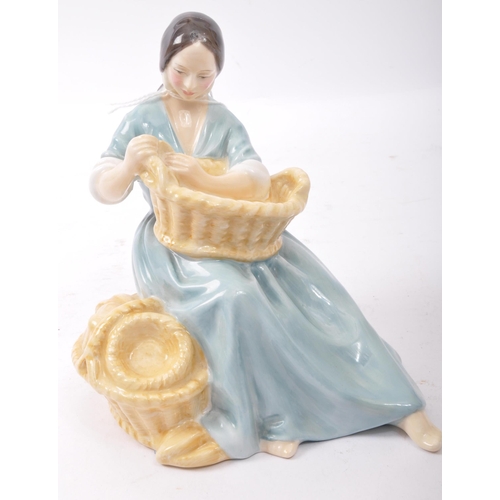 69 - A vintage 20th century circa 1960s Royal Doulton fine bone china figurine of 'The Basket Weaver' HN ... 