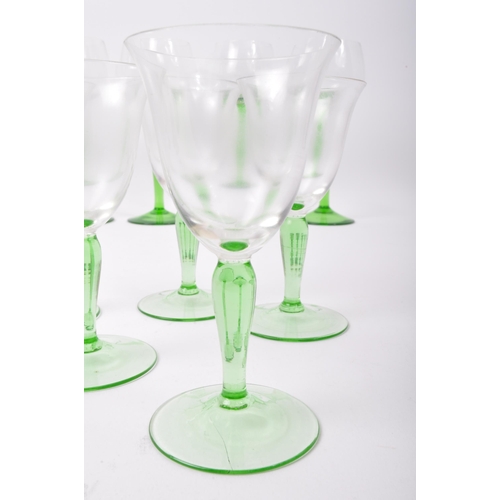 78 - An assortment of vintage retro mid 20th century emerald and clear drinking glasses to include a set ... 