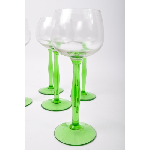 78 - An assortment of vintage retro mid 20th century emerald and clear drinking glasses to include a set ... 
