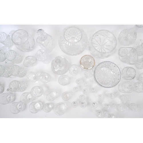 79 - A large collection of vintage 20th century cut glass items. The lot to include decanters, an oversiz... 