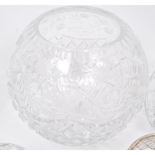 79 - A large collection of vintage 20th century cut glass items. The lot to include decanters, an oversiz... 