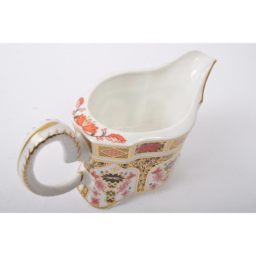 84 - Royal Crown Derby - Ram Cream Jug - A vintage 20th century Royal Crown Derby bone china cream jug in... 