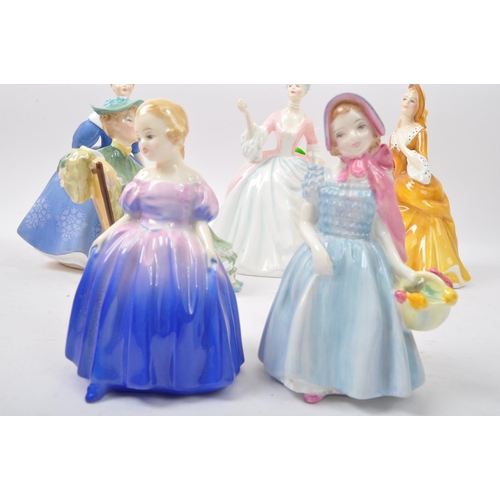 99 - An assortment of vintage 20th century bone china and bisque figures to include Royal Doulton Masquer... 