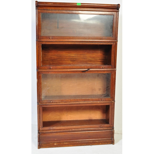 1006 - An original early 20th Century Globe Wernicke stacking modular barrister / lawyers bookcase having s... 
