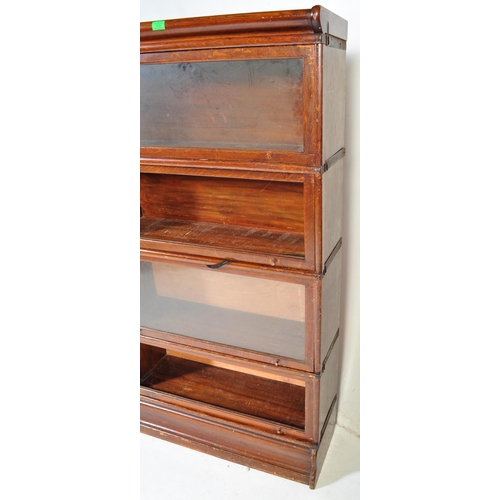 1006 - An original early 20th Century Globe Wernicke stacking modular barrister / lawyers bookcase having s... 