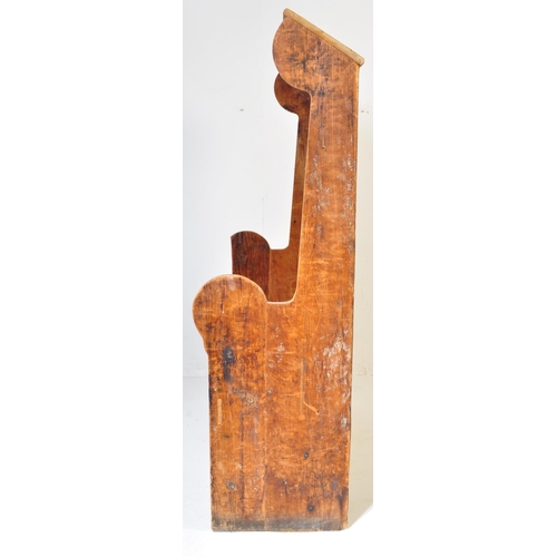 1010 - A 19th Century Victorian pine tavern settle bench pew. Having a canopy top over a panelled back flan... 