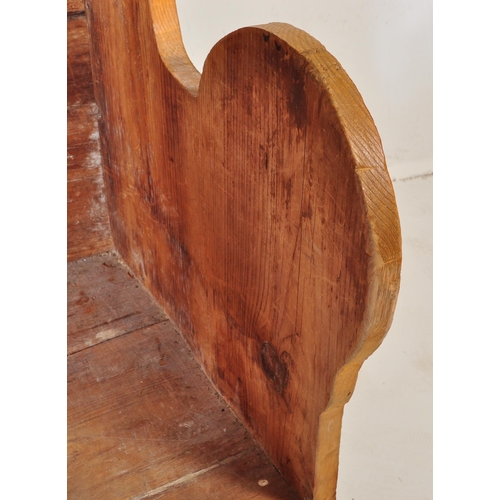 1010 - A 19th Century Victorian pine tavern settle bench pew. Having a canopy top over a panelled back flan... 