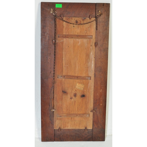 1012 - Early 20th century carved hardwood Asiatic wall mirror. Of rectangular form having carved relief wor... 