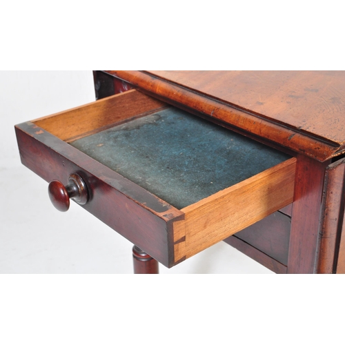 1015 - A 19th century George III mahogany ladies drop leaf work table. Raised on turned legs with fitted fr... 