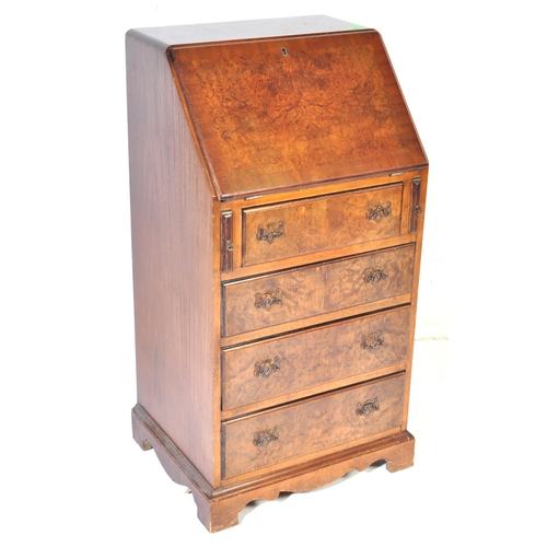 1020 - Queen Anne revival walnut ladies writing bureau desk. Raised on a plinth base with upright bank of d... 
