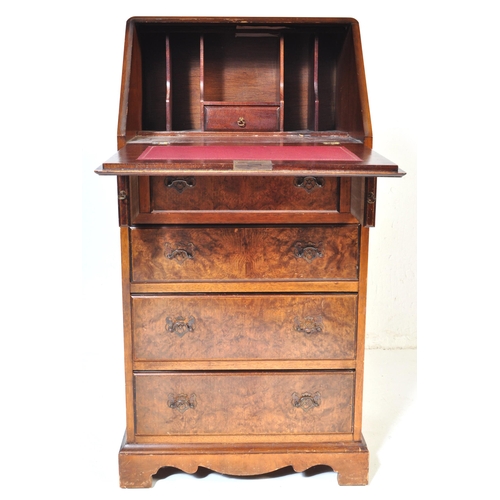 1020 - Queen Anne revival walnut ladies writing bureau desk. Raised on a plinth base with upright bank of d... 