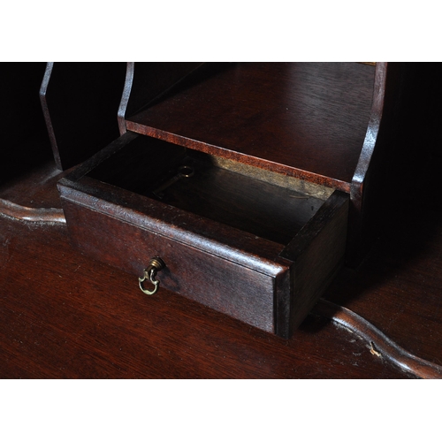1020 - Queen Anne revival walnut ladies writing bureau desk. Raised on a plinth base with upright bank of d... 