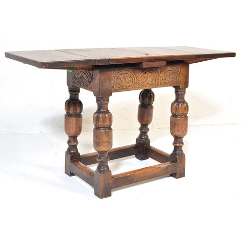 1023 - Jacobean revival peg jointed oak stool - draw leaf side table. Raised on cup and cover legs with squ... 