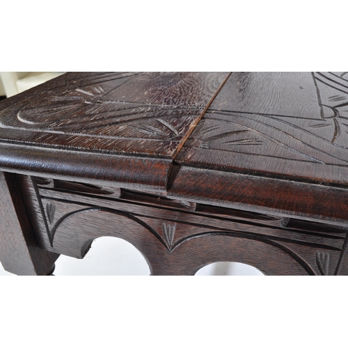 1026 - A pair of 20th century Jacobean Revival circa 1920soak side occasional tables, each with carved deco... 