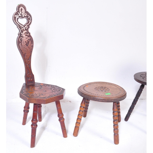 1027 - An assortment of early 20th century and later oak furniture pieces to include a carved Welsh spinnin... 
