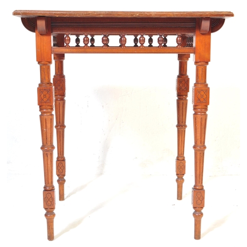 1031 - Victorian 19th century mahogany Aesthetic movement square centre table. Raised on reeded and taperin... 
