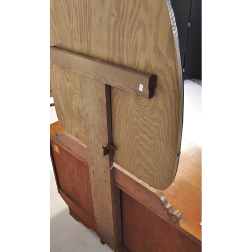 1033 - A vintage 20th Century Art Deco oak dressing chest of drawers with shaped mirror. Rectangular form w... 