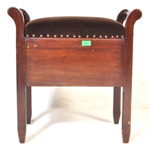 1035 - An early 20th Century Edwardian piano stool. Of rectangular form with brown upholstered fabric cushi... 
