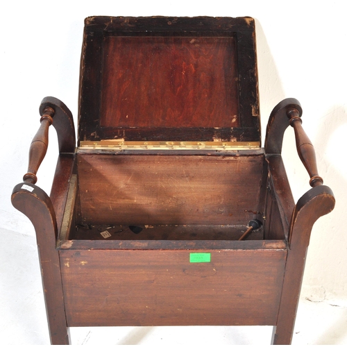 1035 - An early 20th Century Edwardian piano stool. Of rectangular form with brown upholstered fabric cushi... 
