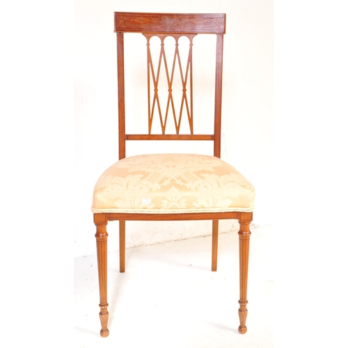 1039 - An early 20th Century Edwardian satin wood marquetry inlaid dining hall chair. Having a harebell swa... 