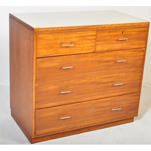 550 - A retro vintage mid 20th Century Beautility teak wood chest of drawers. The bank of two over three d... 