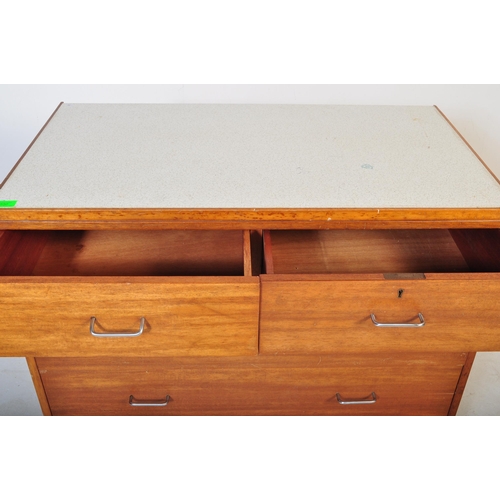 550 - A retro vintage mid 20th Century Beautility teak wood chest of drawers. The bank of two over three d... 