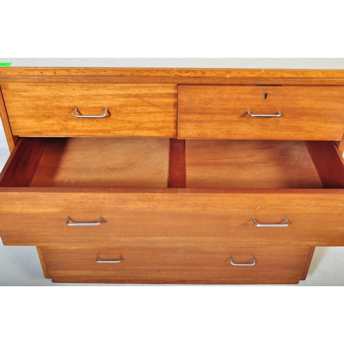 550 - A retro vintage mid 20th Century Beautility teak wood chest of drawers. The bank of two over three d... 