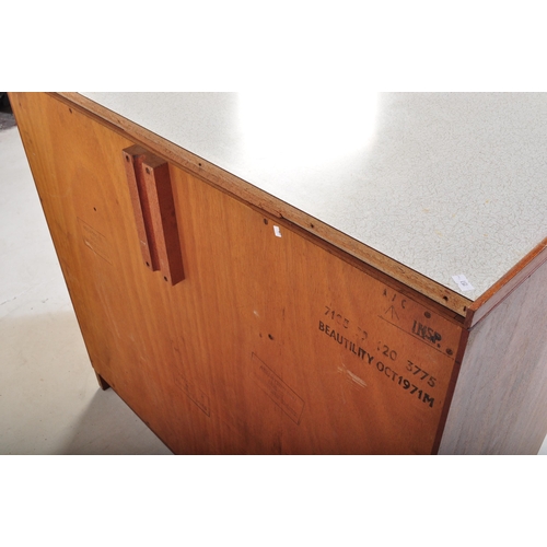 550 - A retro vintage mid 20th Century Beautility teak wood chest of drawers. The bank of two over three d... 