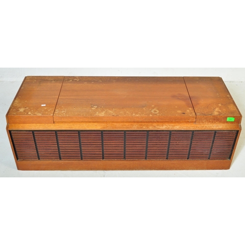 553 - A vintage retro mid 20th century teak stereogram with lift up top. Legs AF but present. Measures app... 