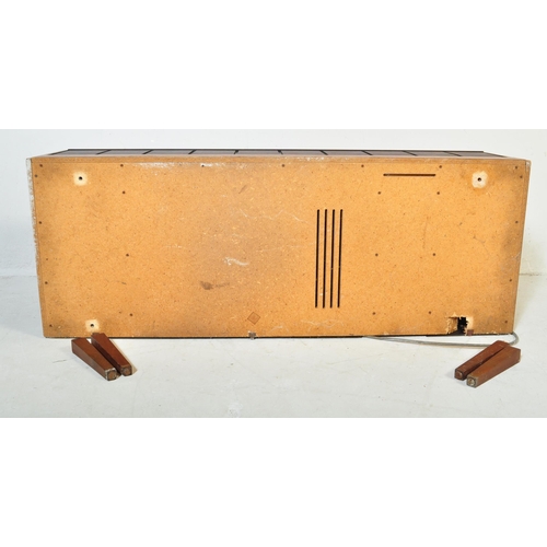 553 - A vintage retro mid 20th century teak stereogram with lift up top. Legs AF but present. Measures app... 