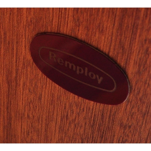 554 - A retro mid 20th century circa. 1960's teak bureau having a fall front cupboard door over fully appo... 