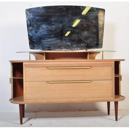 559 - A retro vintage mid 20th Century oak dressing table having a mirror to back with twin suspension set... 