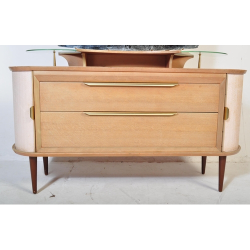559 - A retro vintage mid 20th Century oak dressing table having a mirror to back with twin suspension set... 