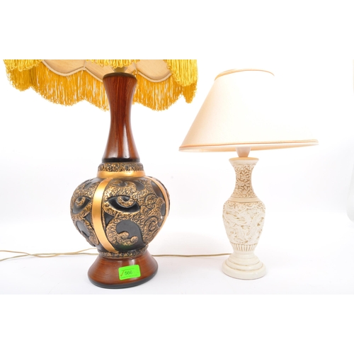 566 - A pair of vintage 20th Century table desk lamp lights. One having a white resin carved dragon taperi... 