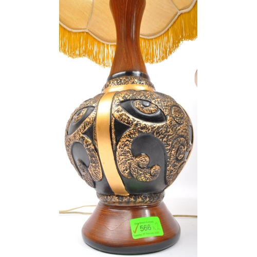 566 - A pair of vintage 20th Century table desk lamp lights. One having a white resin carved dragon taperi... 