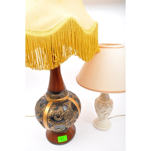 566 - A pair of vintage 20th Century table desk lamp lights. One having a white resin carved dragon taperi... 