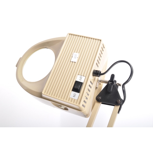 571 - Two retro vintage 20th century anglepoise style desk top table lamps. The lot to include a TaoTronic... 