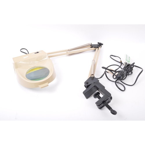 571 - Two retro vintage 20th century anglepoise style desk top table lamps. The lot to include a TaoTronic... 