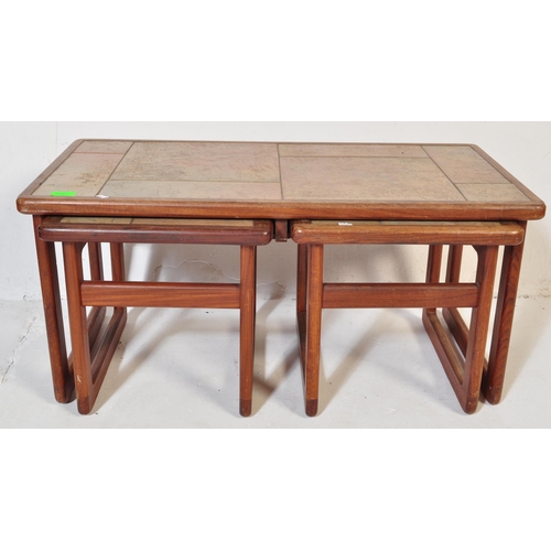 578 - A mid 20th Century retro vintage tile top nest of tables. Of rectangular form with two other tile to... 