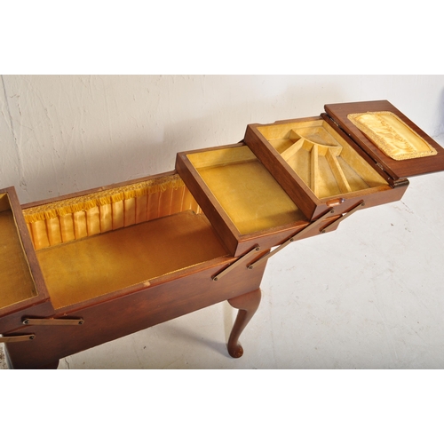 583 - Mid century beech wood sewing box. Of large form being raised on cabriole legs with pad feet support... 
