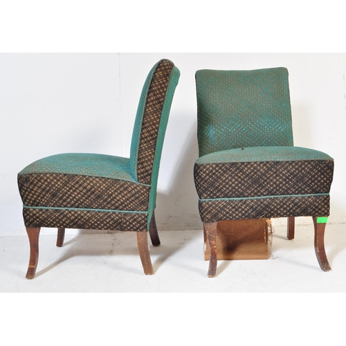 586 - A pair of retro vintage mid 20th Century 1940s cocktail chairs. Having a upright backrest, with squa... 