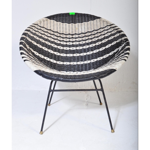 589 - A retro vintage mid 20th Century circa 1960s woven black & white satellite sputnik chair. Of round f... 