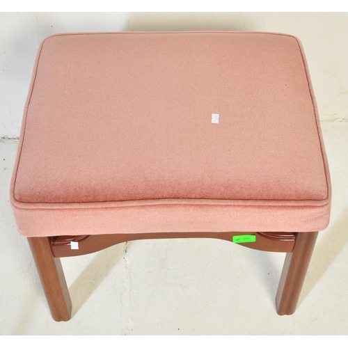 590 - A mid 20th Century retro vintage mahogany G Plan footstool. Of rectangular form with pink upholstere... 