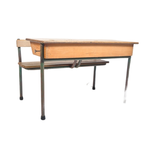 620 - A matching pair of retro vintage mid 20th Century French school desk benches with each comprising of... 